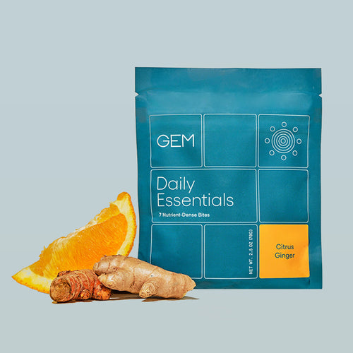 One 7 Bite pack of GEM Citrus Ginger Daily Essentials nutrient-dense multivitamin Bites featuring real food ingredients ginger, citrus, and turmeric root. 